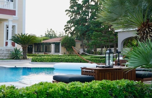 Egira Villa | Villa Dolphin: Beachfront Maisonette with Pool & Spa