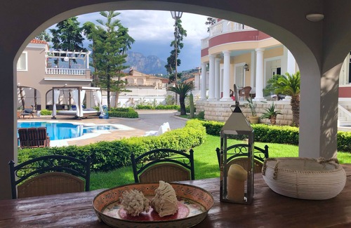 Egira Villa | Villa Dolphin: Beachfront Maisonette with Pool & Spa