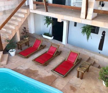Rio Vermelho Apartment | Relax at Villa Domenico: Oceanfront Escape with Pool & Spa