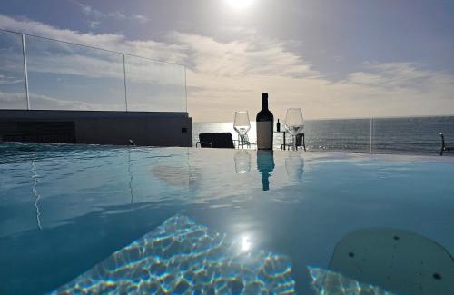 Baia Verde House | Indulge at Villa Dune: Rooftop Pool & Oceanfront Bliss