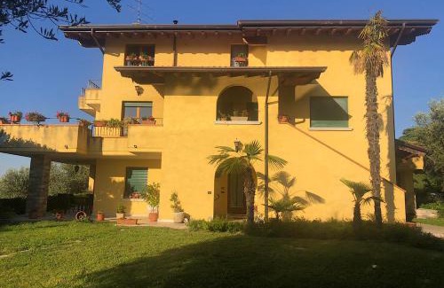 Manerba del Garda House | Beachfront Villa Elena: Family-Friendly Ocean View Retreat