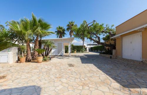 Capilungo Villa | Villa Eleonora: Poolside Retreat with Perfect 10 Rating