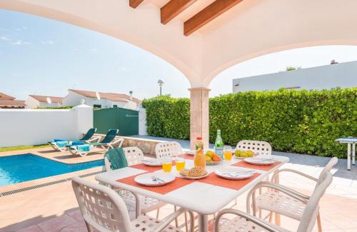 Cap d'Artrutx Villa | Discover Villa Enrich: Family-Friendly with Pool Access