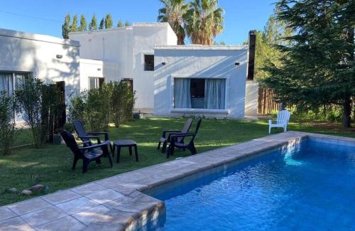 Chacras de Coria House | Villa Entre Fresnos: Oceanfront Retreat with Hot Tub, 9.8 Rated
