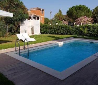 Sarroch Villa | Experience Villa Ersilia: Oceanfront, Pet-Friendly Retreat