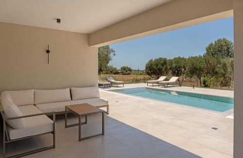 Minia Villa | Villa Erato - Elysian Villas, Steps from the Beach & Pool