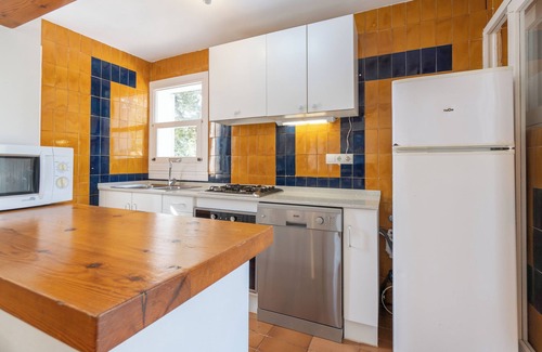 San Antonio Bay Cottage | Indulge at Villa Can Torrent: Family-Friendly & Spa Amenities