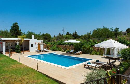 Santa Gertrudis Villa | Discover Villa Curreu III: 4-Star Family Retreat with Pool