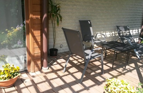 Business District Villa | Villa EverGreen: Downtown Retreat with Private Garden & Hot Tub
