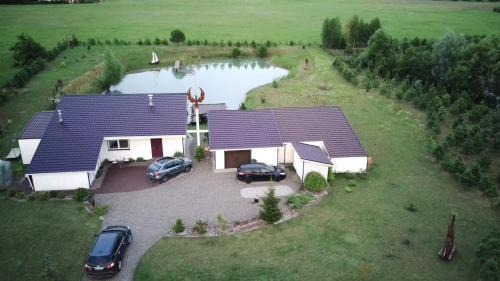 Klaipeda District Municipality Villa | Villa Feniksas: Oceanfront Retreat with Hot Tub & Pet Friendly