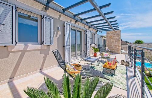 Kastelir Villa | Villa Flamingo: Oceanfront Escape with 9.9/10 Guest Rating