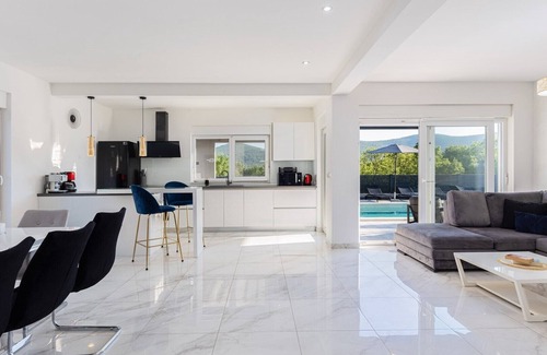 Dicmo Villa | Villa Gabriel: Relax by the Heated Pool and Enjoy Spa Amenities