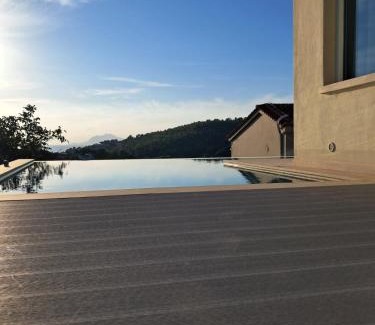 Troulos Villa | Discover Villa George: Oceanfront Retreat in Skiathos