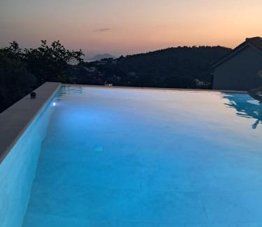 Troulos Villa | Discover Villa George: Oceanfront Retreat in Skiathos