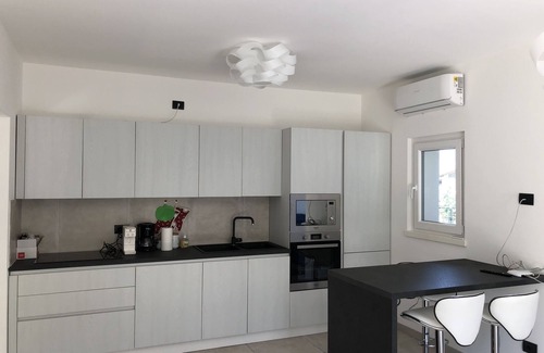 Colico Apartment | Villa Ginevra Colico: Scenic Retreat with Pool & Ocean Views