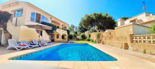 Moraira Villa | Villa Haleakala: Family-Friendly Haven with Pool Access