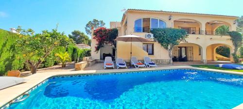 Moraira Villa | Villa Haleakala: Family-Friendly Haven with Pool Access