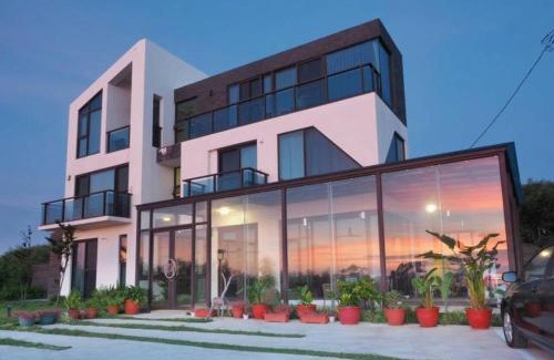 Baisha House | Villa Iris: Oceanfront Retreat with Private Beach Access