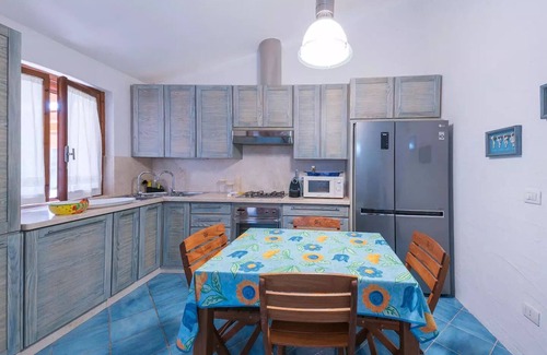 Santa Margherita di Pula Villa | Idyllic Villa Steps from the Beach with Garden Oasis