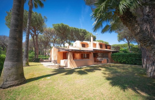 Santa Margherita di Pula Villa | Idyllic Villa Steps from the Beach with Garden Oasis