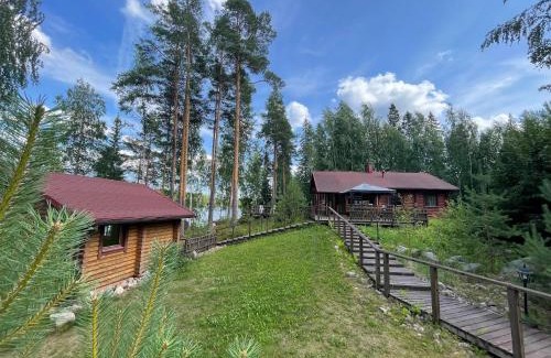 Lotjola Villa | Beautiful Villa Joutsen: Oceanfront Retreat with Hot Tub