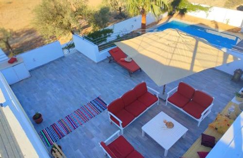 Aghir Villa | Unwind at Villa Kenais Sunset with Ocean Views & Spa