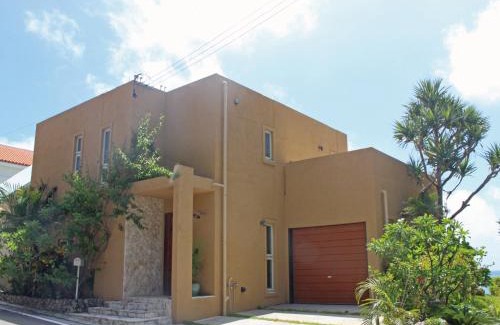 Ginoza House | Villa Kukuru: Oceanfront Oasis with Child-Friendly Amenities