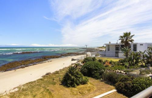 Gordons Bay Central Apartment | Experience Villa Kyma: Oceanfront Haven for Families