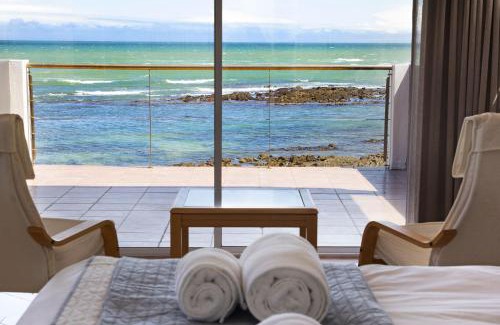 Gordons Bay Central Apartment | Experience Villa Kyma: Oceanfront Haven for Families