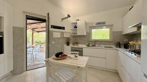 Villaggio Piras Villa | Pet-Friendly Villa la Bonaccia: 4-Star Rated Retreat