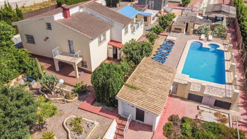 Polop Villa | Pet-Friendly Gran Villa La Marina with Oceanfront Pool Access
