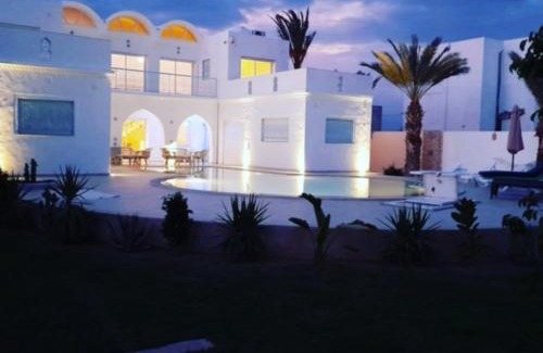 Arkou Villa | Elegant Villa La Palmeraie d'Arkou with Pool & Ocean Views