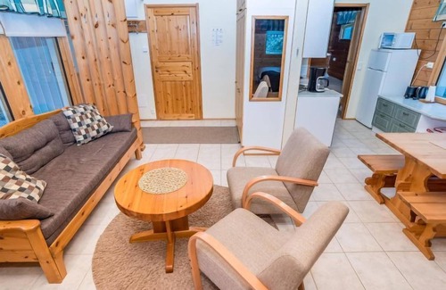 Kuusamo House | Relax at Villa Lakka with Lake Views and Spa Amenities