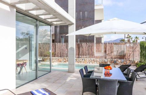 Diputacion de Rincon de San Gines Villa | Villa Las Dalias 1: Oceanfront Retreat with Pool Access