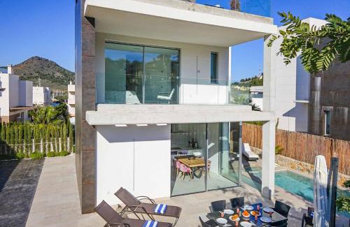 Diputacion de Rincon de San Gines Villa | Villa Las Dalias 1: Oceanfront Retreat with Pool Access
