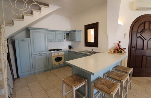 La Conia Villa | Villa Lu Nibaru: 4-Bedroom Retreat with Sea View Amenities
