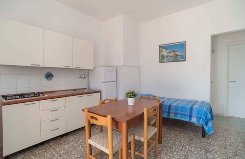 Mattinata Apartment | Seaside Apartment with Beach Service and Solarium Access