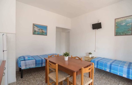 Mattinata Apartment | Seaside Apartment with Beach Service and Solarium Access