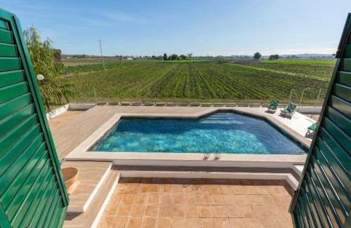 San Fulgencio Villa | Villa Luna: Oceanfront Haven with Pool and BBQ Amenities