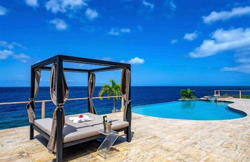 St. Marie Villa | Oceanfront Bliss at Villa Magic Time with Pool & Hot Tub