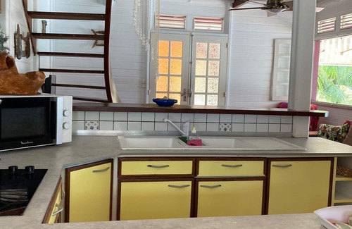 Sainte-Anne Villa | Experience Villa Mahogany: Oceanfront Bungalow Retreat