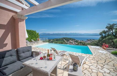 Petaleia Villa | Villa Malva - Kassiopi View with Oceanfront Pool Access