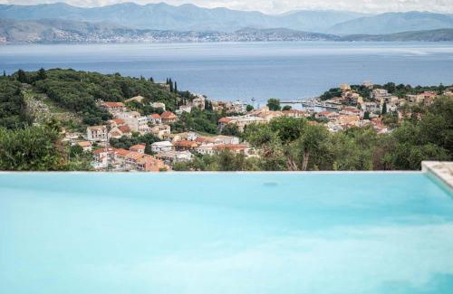 Petaleia Villa | Villa Malva - Kassiopi View with Oceanfront Pool Access
