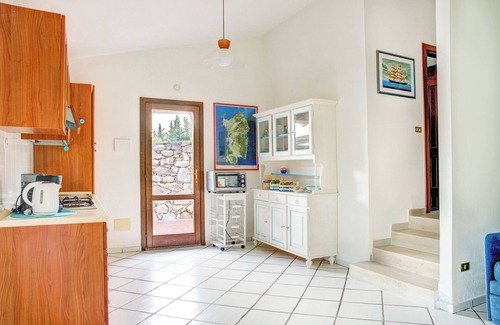 Capo d'Orso Apartment | Villa Maria Trilocale: Oceanfront Retreat with Breakfast