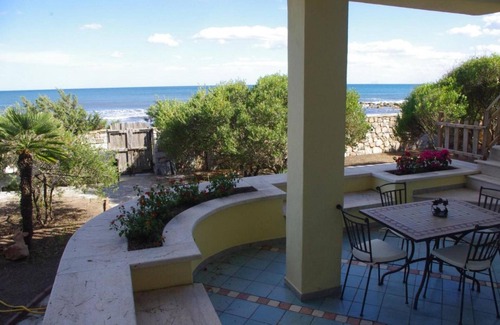 Cala Liberotto Villa | Villa 'Maria': Oceanfront Retreat with Private Terrace & Wi-Fi