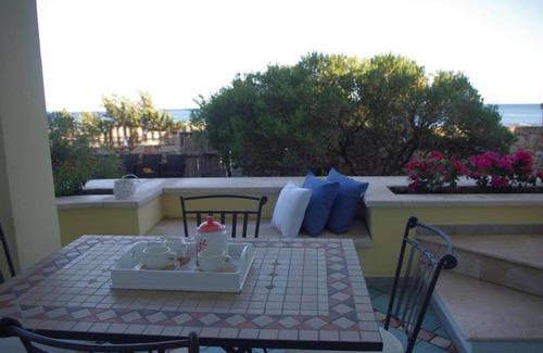 Cala Liberotto Villa | Villa 'Maria': Oceanfront Retreat with Private Terrace & Wi-Fi
