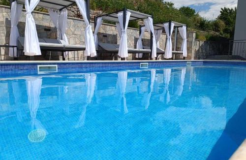 Trilj Villa | Villa Marija: Oceanfront Retreat with Heated Pool & Hot Tub