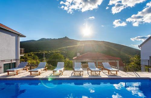 Trilj Villa | Villa Marija: Oceanfront Retreat with Heated Pool & Hot Tub