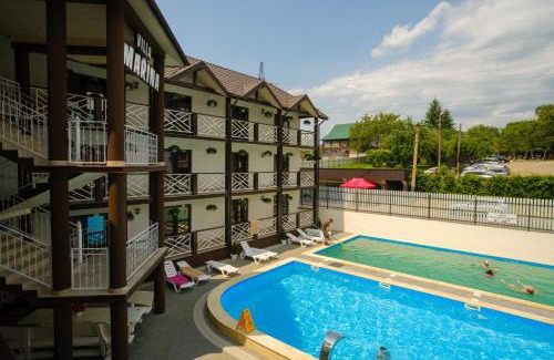 Solotvyno Hotel | Villa MARINA: Oceanfront Bliss with Pool & Dining Options