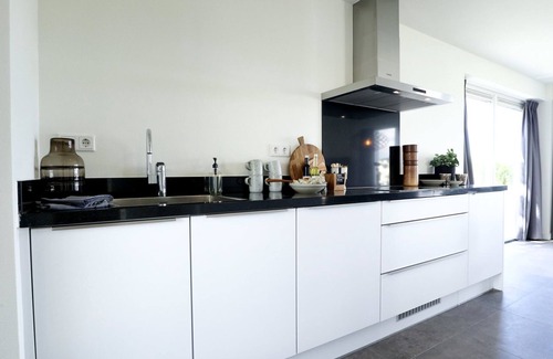 Nijkerk House | Villa Meerzicht 8: Lake View Getaway with Spa Amenities